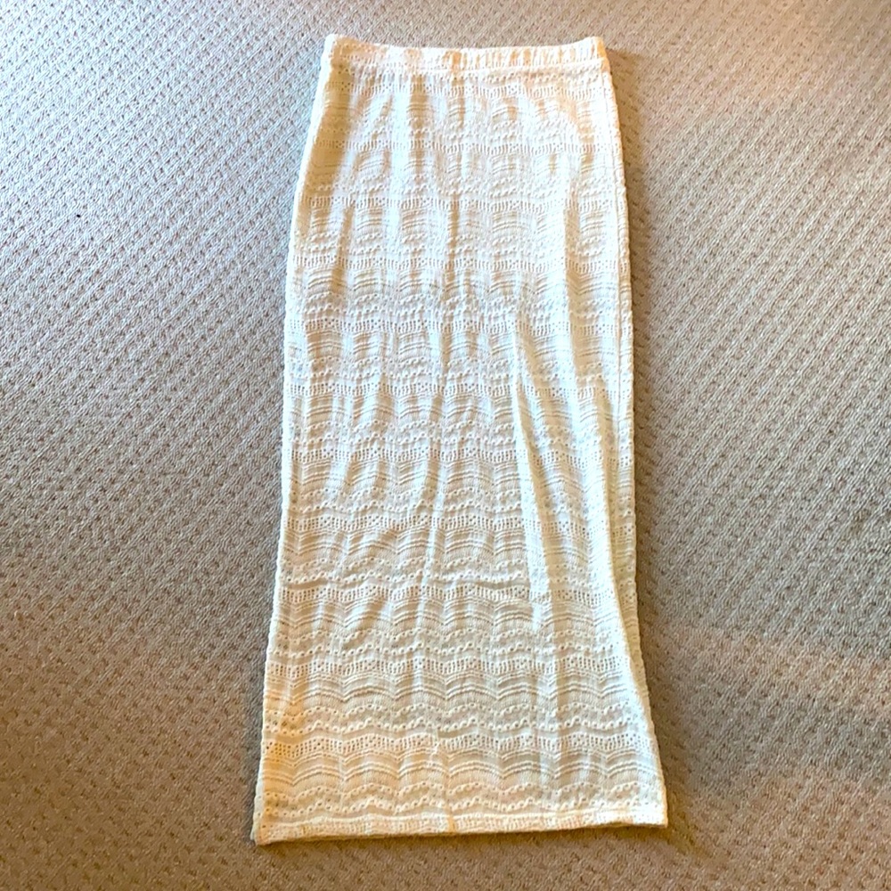 Cream, full length skirt